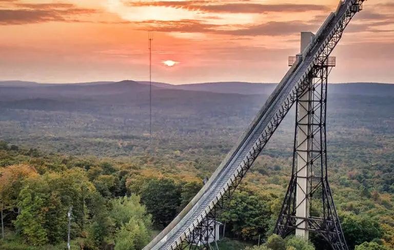 The Copper Peak ski jump tower with the setting sun in the background